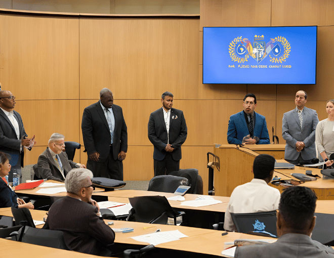 City officials and religious leaders debate towing policies, highlighting moral dilemmas and ethical considerations influenced by diverse religious beliefs.